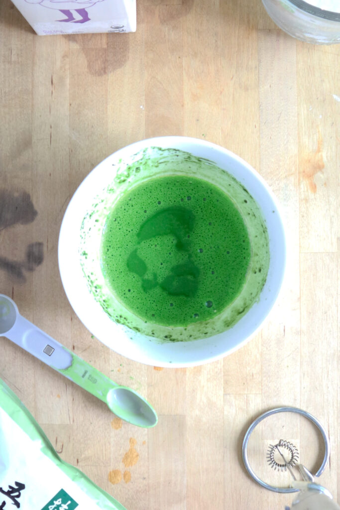 Matcha frothed in water.